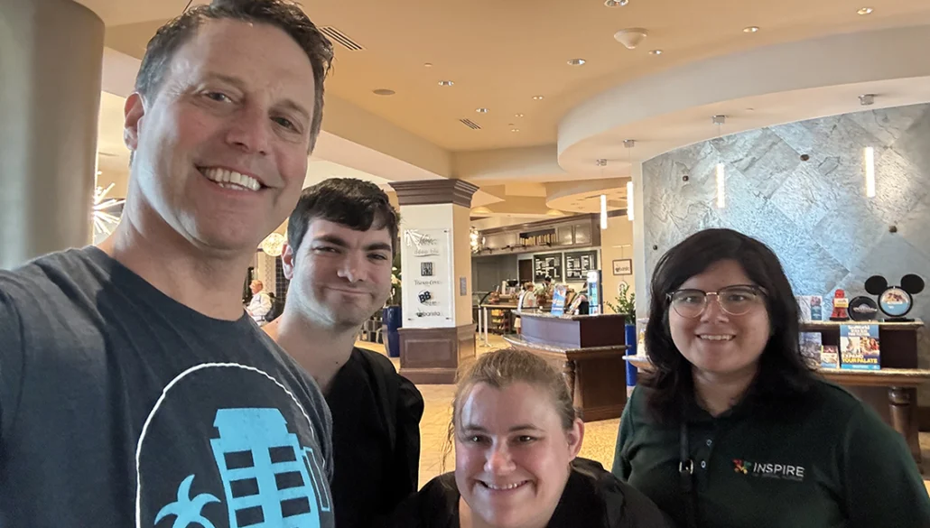 Founder Mike Schugt with hotel workers